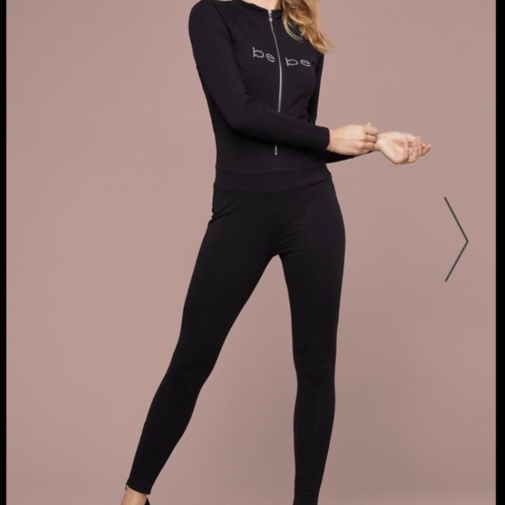 BEBE LOGO ZIP UP JUMPSUIT